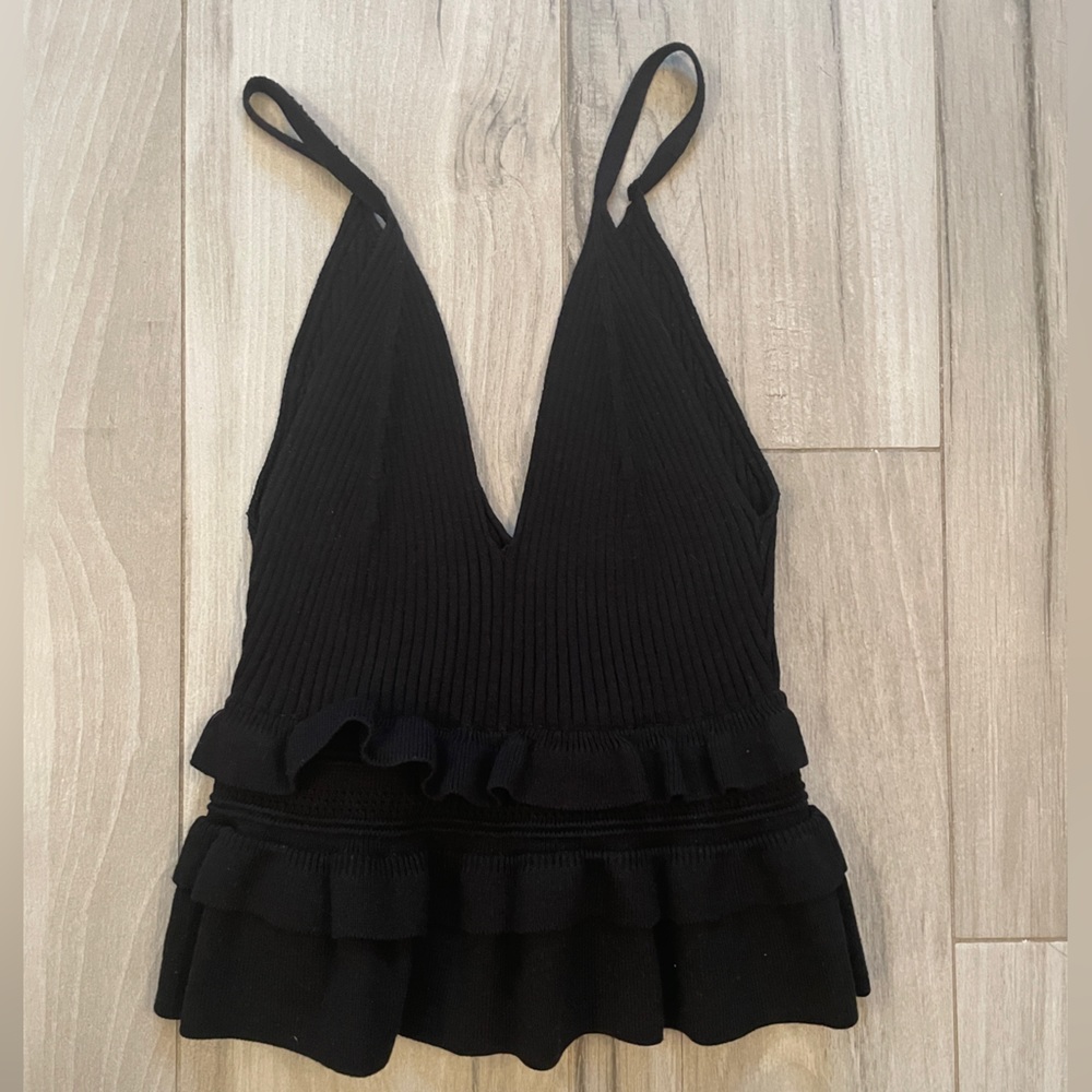 Deep v-neck knitted peplum ruffle top